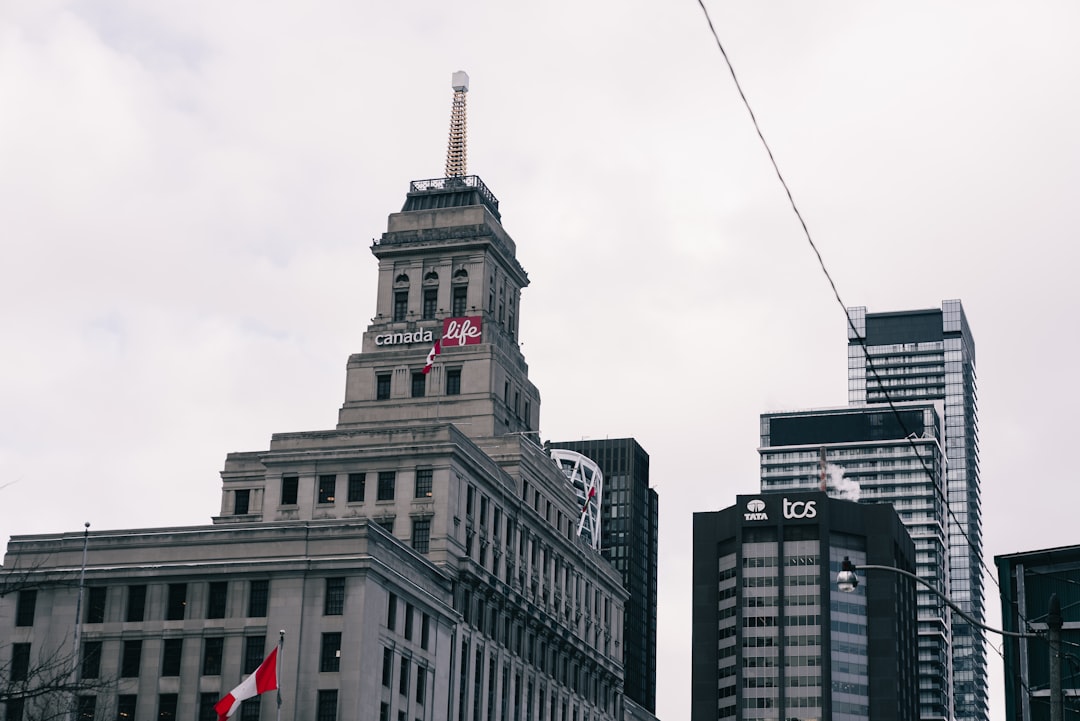 Historic building with modern skyscrapers in background
